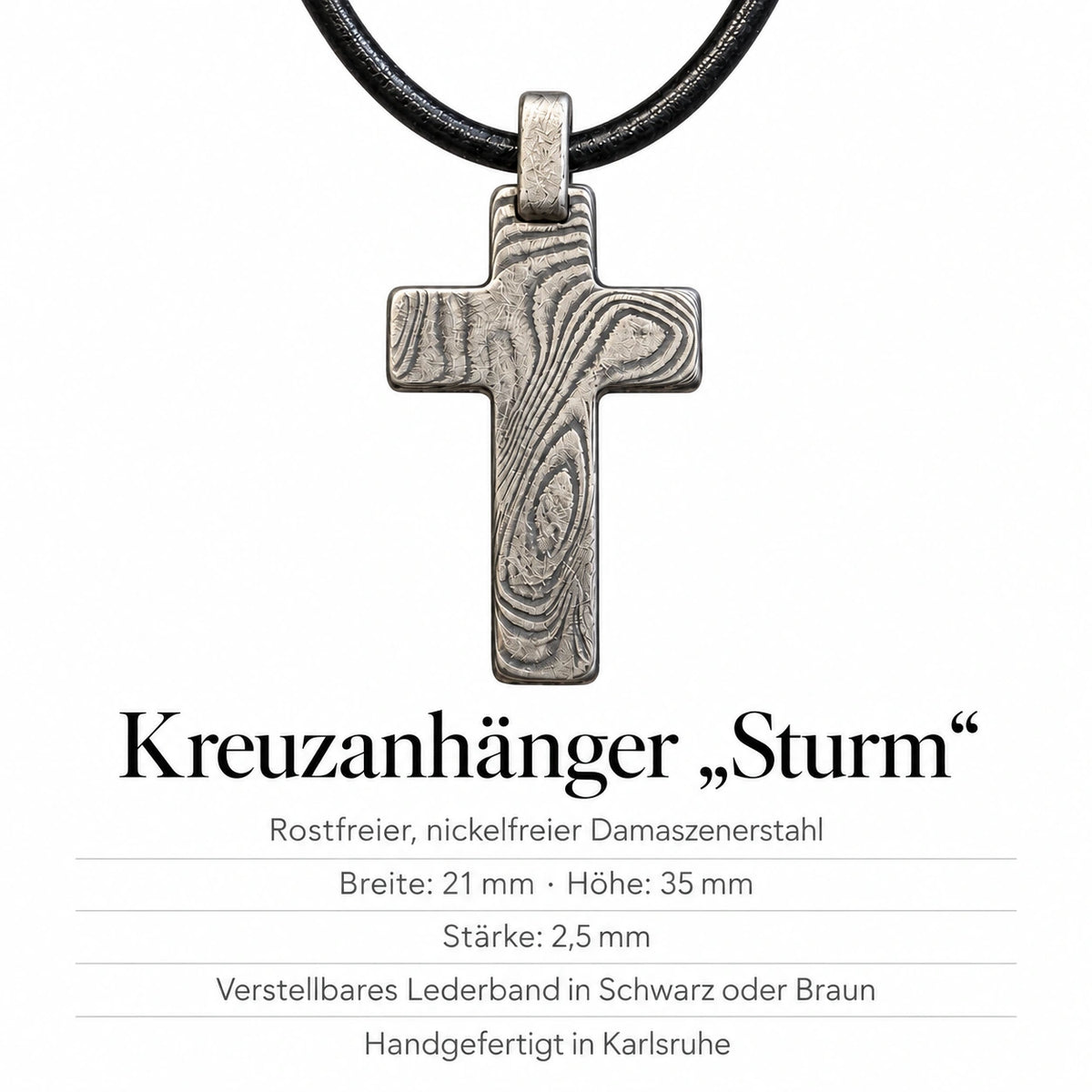 Kreuzanhänger Sturm – rostfreier, nickelfreier Damaszenerstahl; Breite 21 mm, Höhe 35 mm, Stärke 2,5 mm; verstellbares Lederband in Schwarz oder Braun; handgefertigt in Karlsruhe